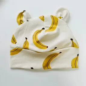 Eddie & Bee organic cotton Baby hat with ears  in Cream "Banana” print.